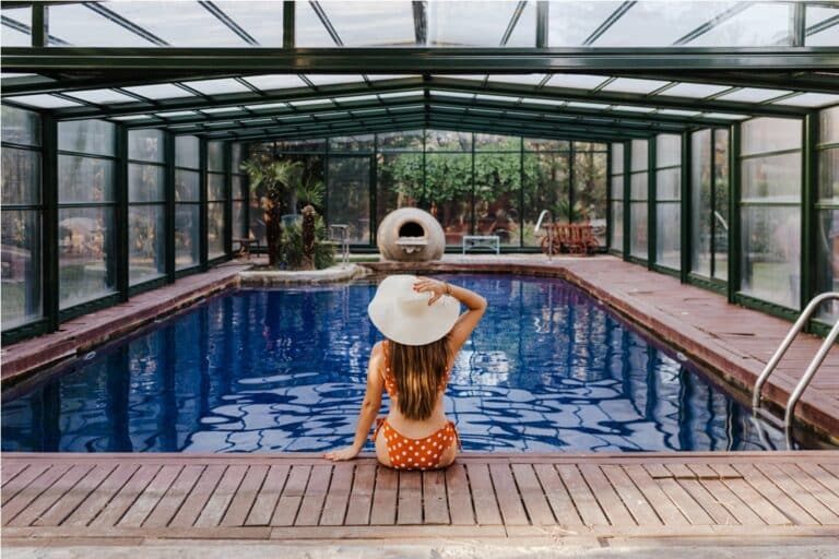 beautiful young woman relaxing in an indoor swimmi 2022 04 12 20 43 04 utc