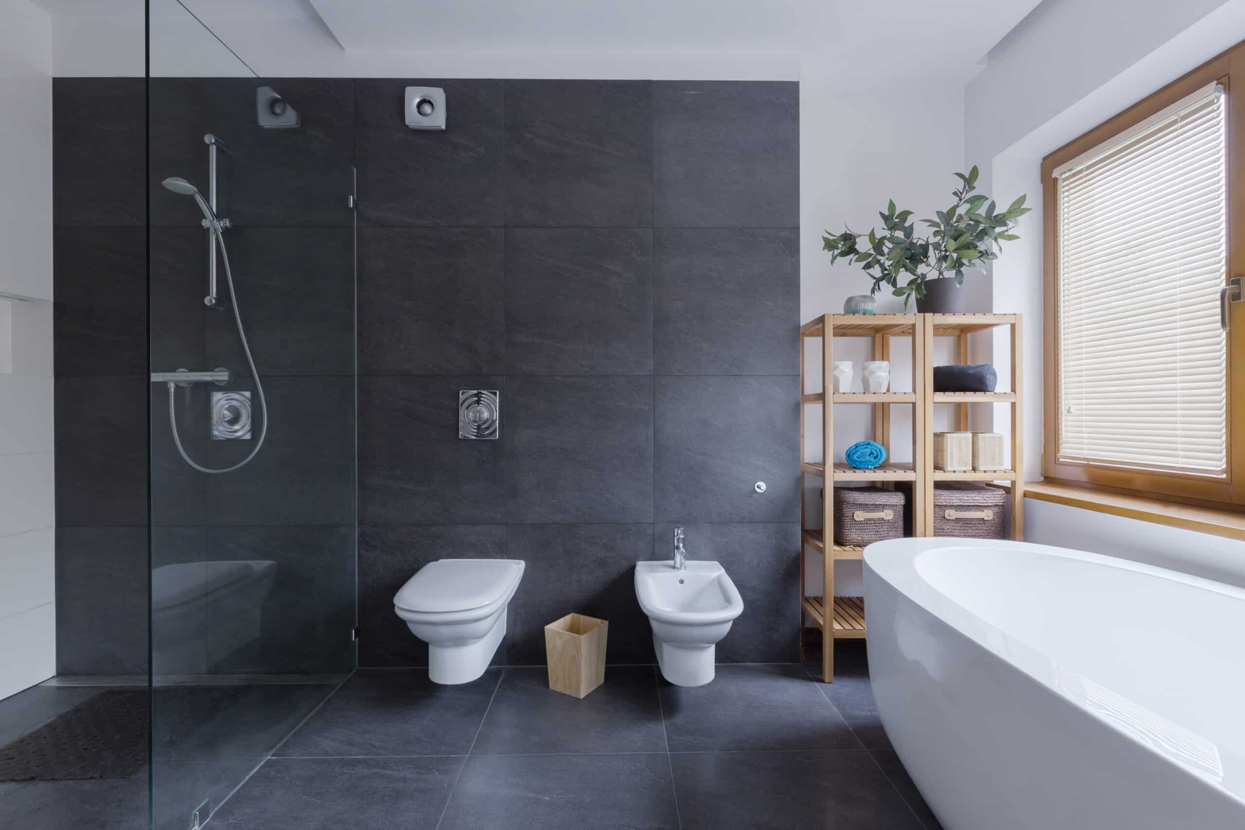 glass shower in travertine bathroom