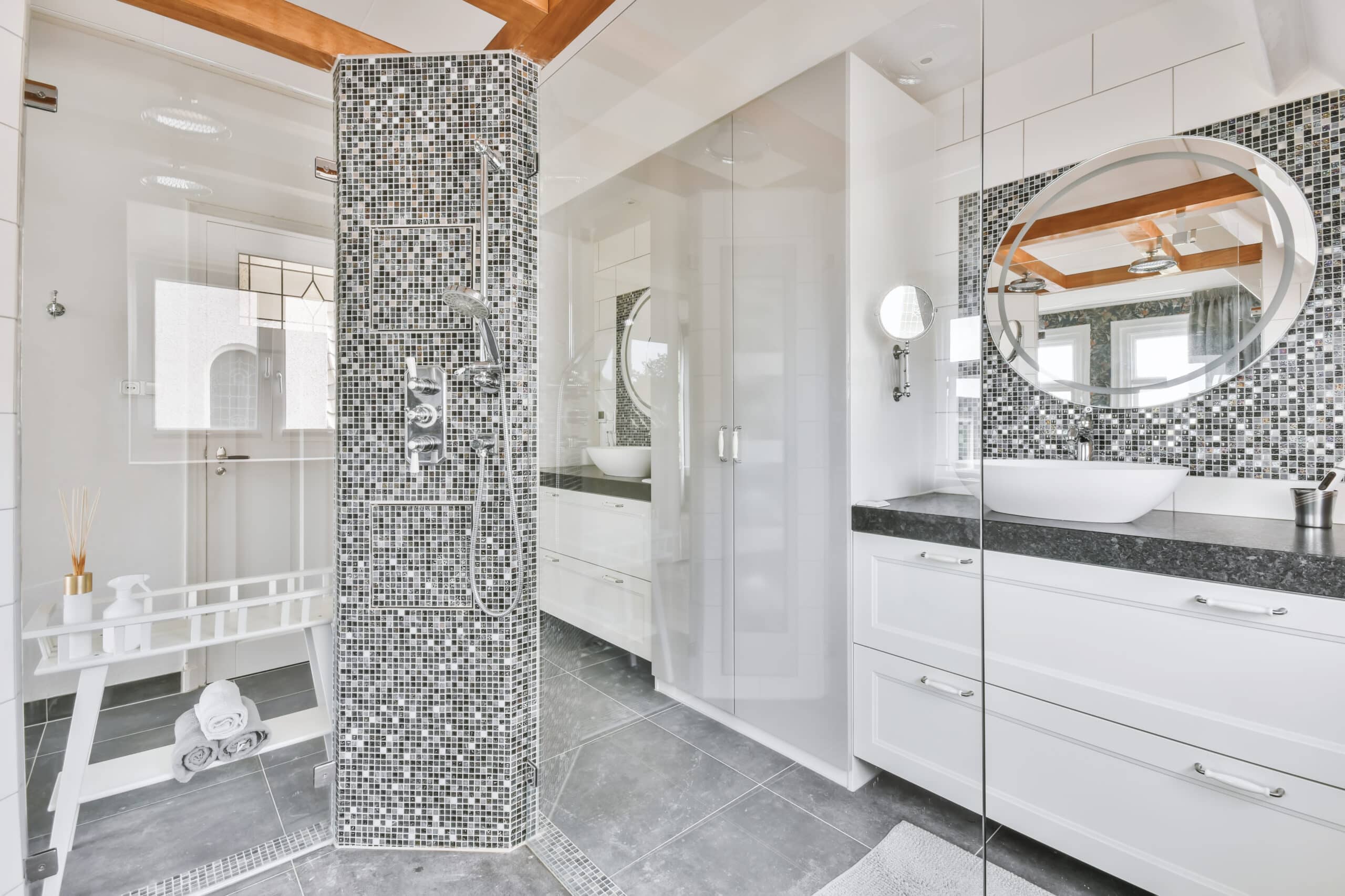 shower room with mosaic floor