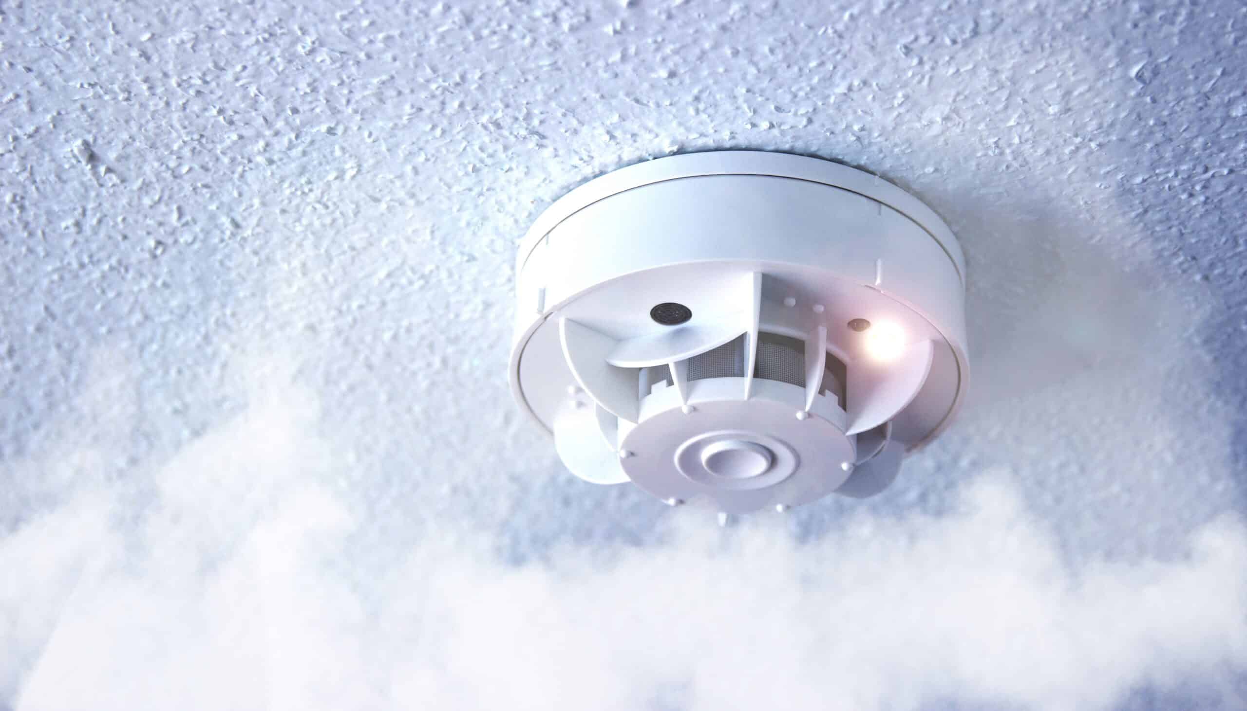 smoke, fire detector. fire protection, with smoke in the foreground.
