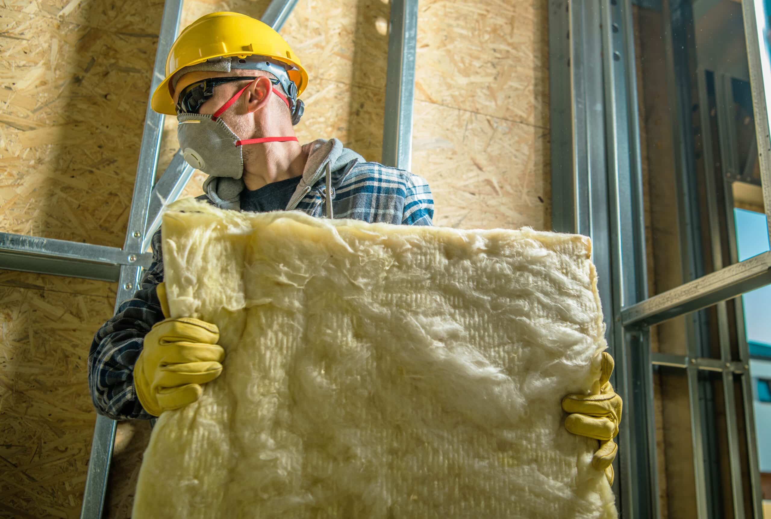 worker with wool insulation
