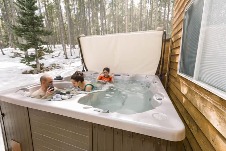 family in a hot tub near a cabin 2022 11 07 21 45 01 utc