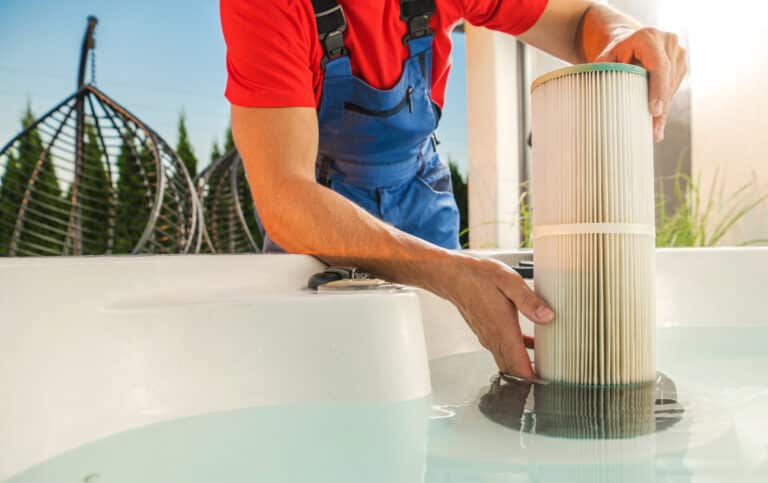 hot tubs technician replacing water filter