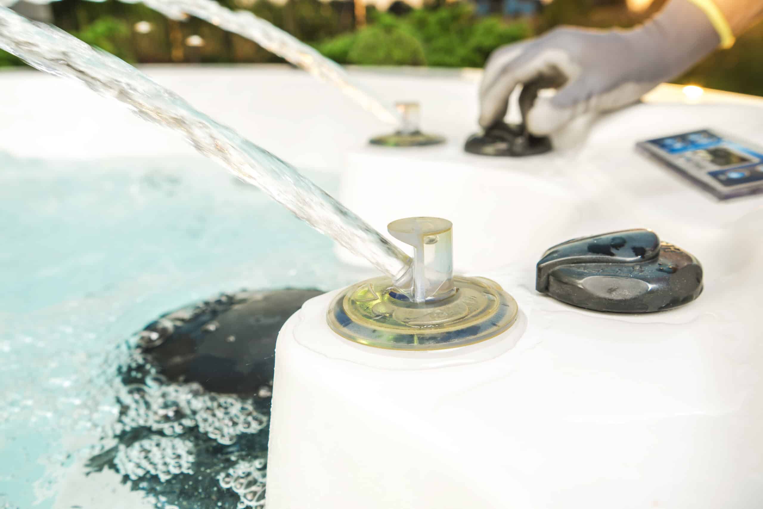 worker testing garden water spa features