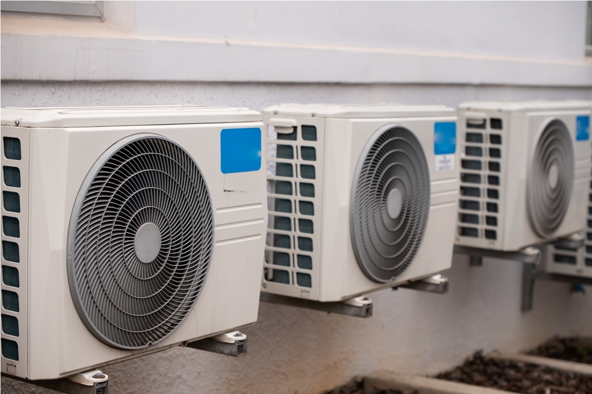 air conditioners mounted on wall outdoors