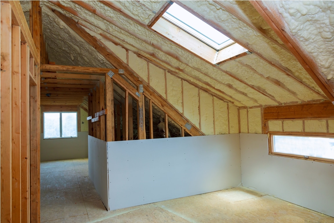 termal insulation installing at the attic insulation of the house