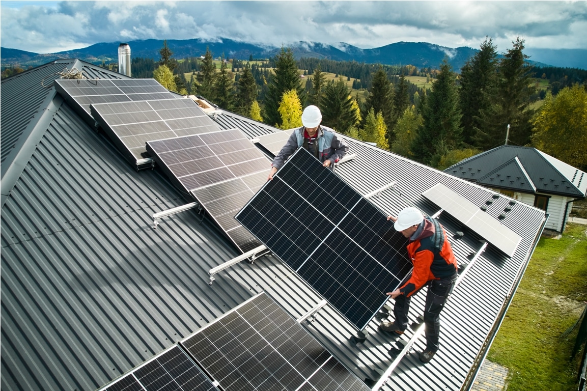 workers installing solar panels on a roof of house 2023 09 29 17 15 32 utc