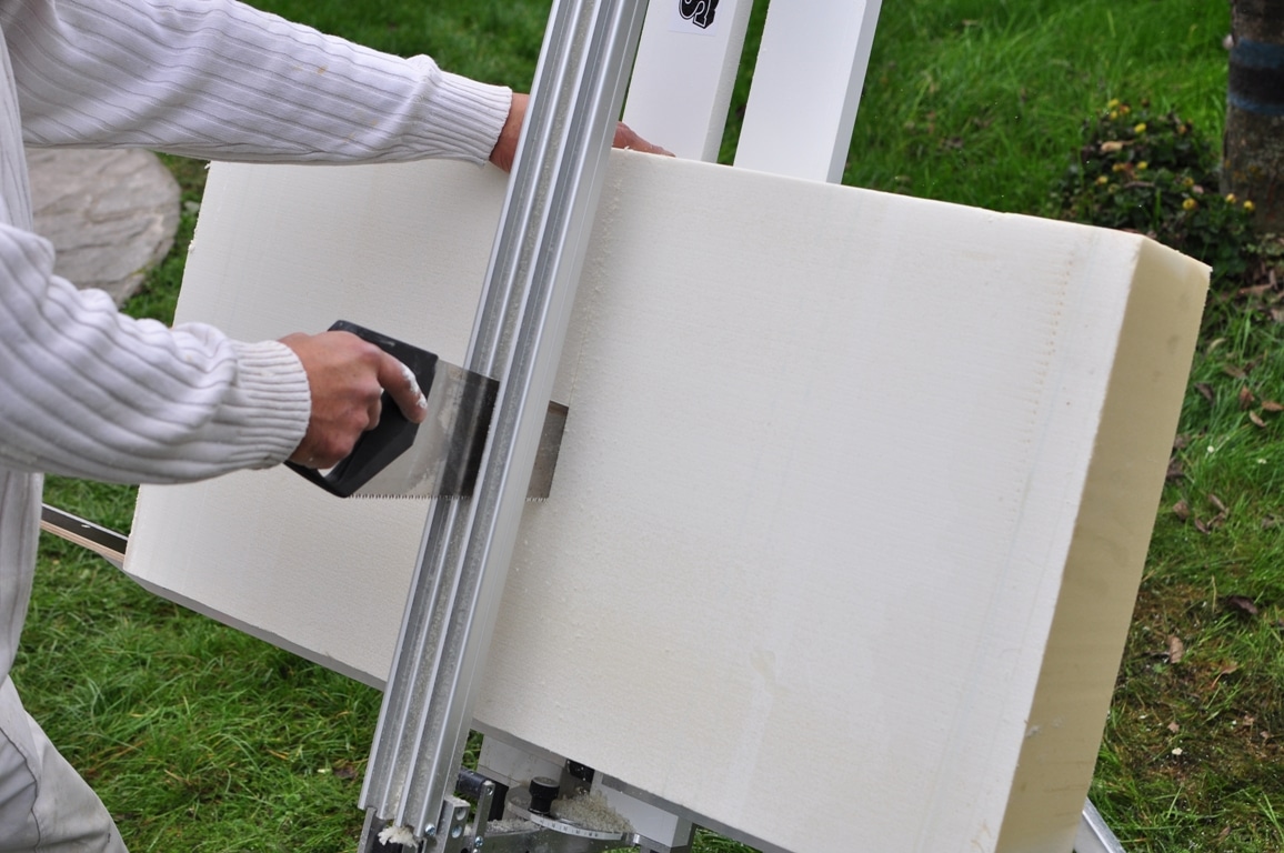 hand of a builder cutting a insulating wall panel 2023 05 06 01 01 46 utc