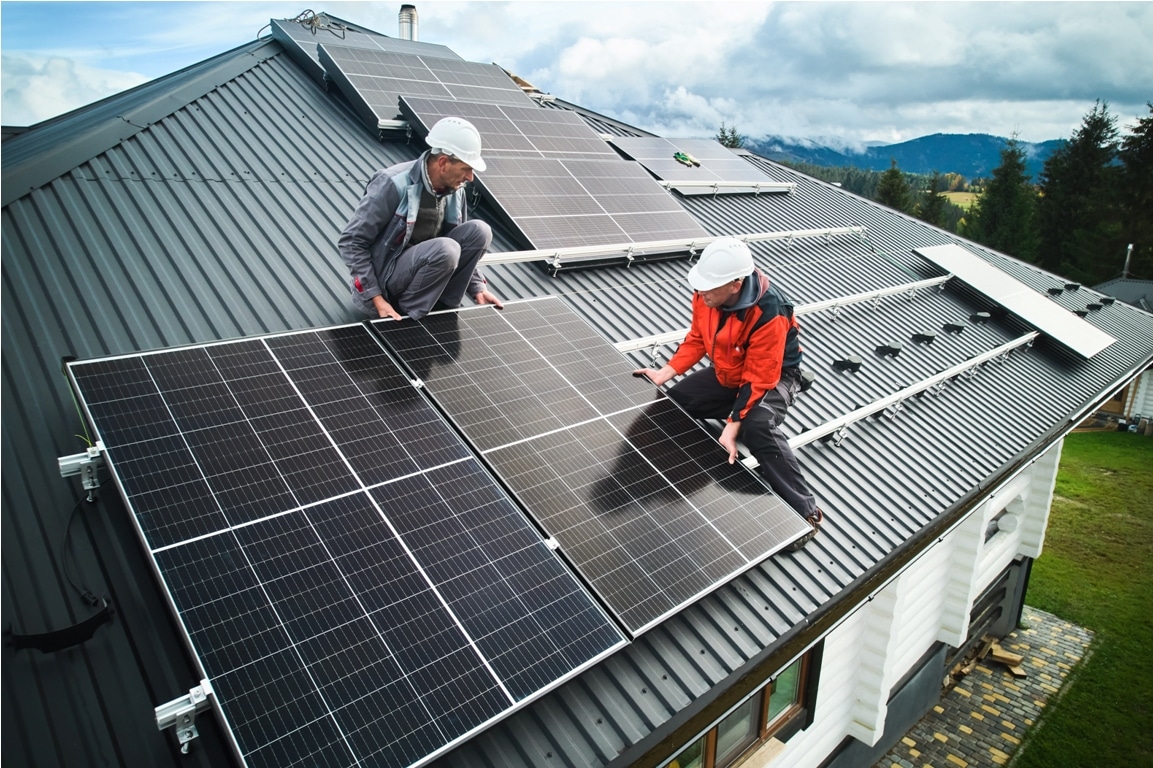 men workers installing solar panels on roof of hou 2023 09 29 17 15 09 utc