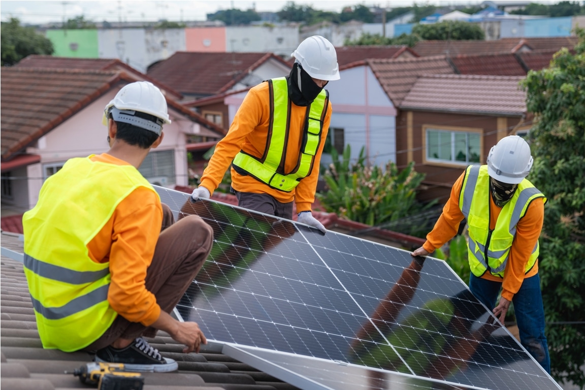 service engineer installing solar cell on the roof 2023 11 03 16 49 18 utc