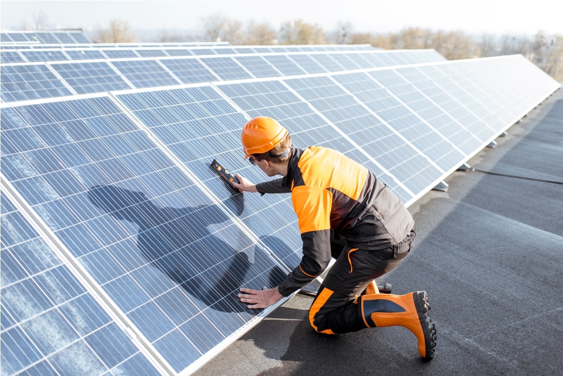 worker installing solar panels 2023 11 27 04 56 43 utc