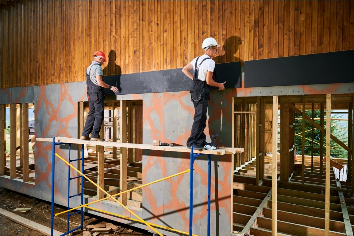 workers cladding facade of house with cement parti 2023 11 27 05 35 46 utc