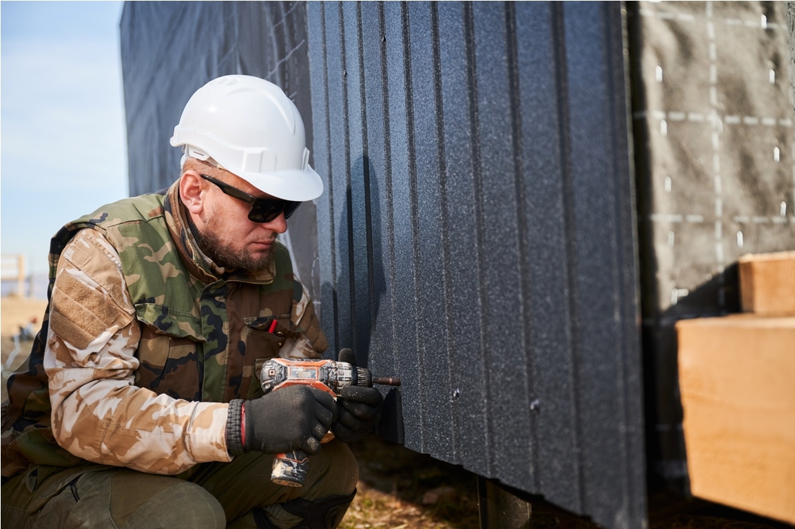 builder installing corrugated iron sheet used as f 2022 08 19 07 46 00 utc